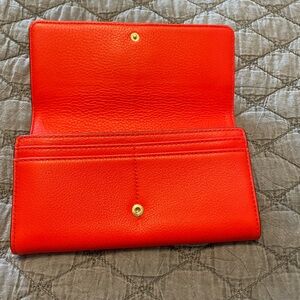 Michael Kors wallet.  Never used. Plenty space for your what haves!!!